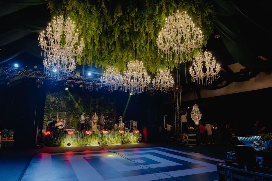 Dance floor beneath suspended chandeliers