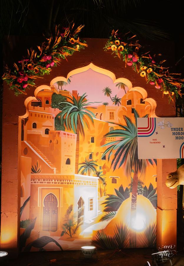 Hand-painted desert palace backdrop with florals