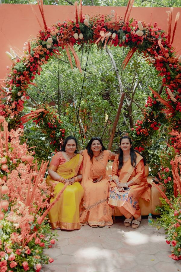Guests seated within the rose arch