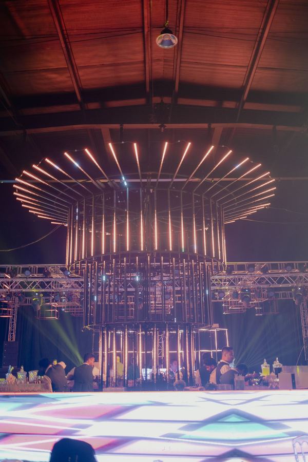 Circular light-bar installation above the dance floor