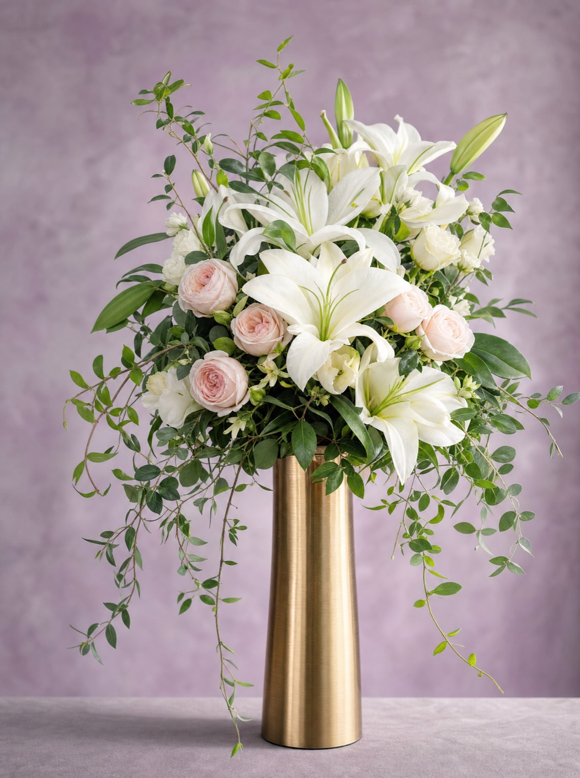 Stargazer's Bouquet of lilies, roses and trailing greenery